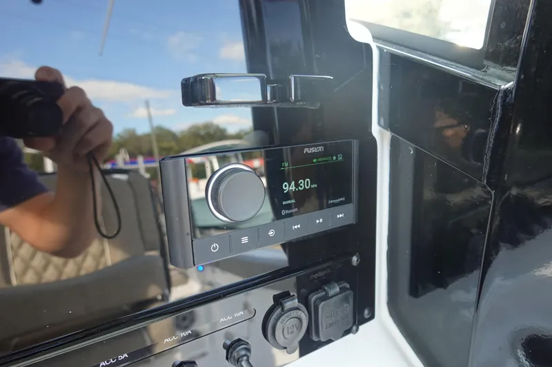 Slide: The Image of Fusion radio system on 2026 Sea Hunt Ultra 255 SE boat dashboard. - 25