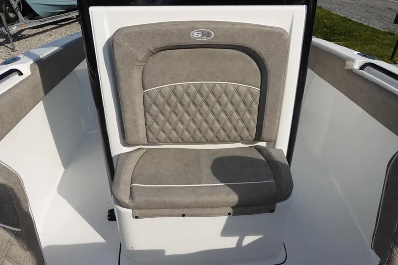 Slide: The Image of 2026 Sea Hunt Ultra 255 SE boat seat with diamond-patterned upholstery. - 28