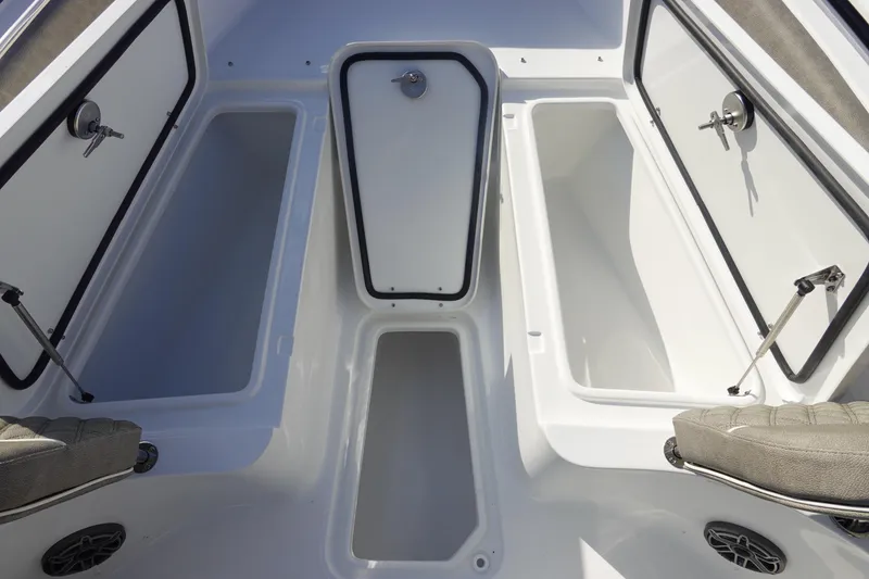 Slide: The Image of Interior storage compartments of 2026 Sea Hunt Ultra 255 SE boat. - 35
