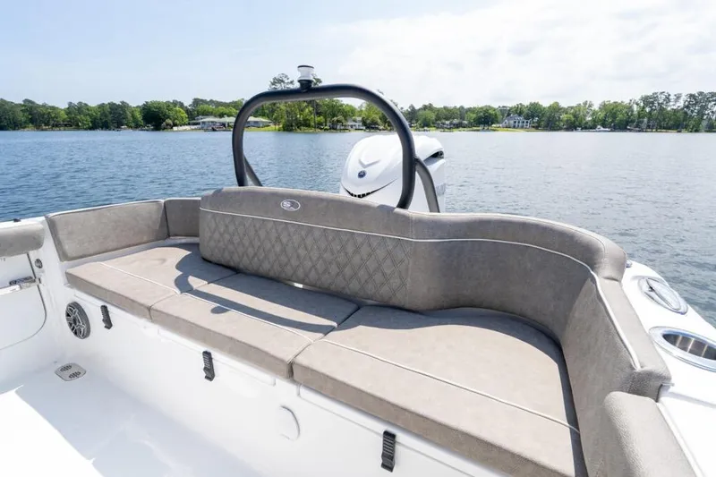 Slide: The Image of 2026 Sea Hunt Ultra 255 SE boat on trailer, parked outdoors. - 5