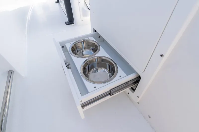 Slide: The Image of Rear view of 2026 Sea Hunt Ultra 255 SE boat ladder and accessories. - 7