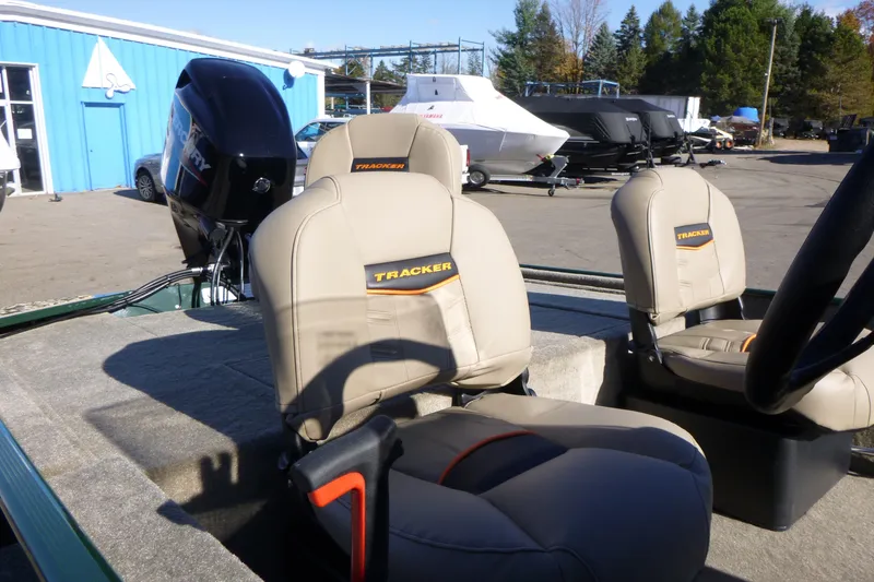 Slide: The Image of 2026 Tracker Bass Tracker Classic Limited boat seats in outdoor showroom. - 13