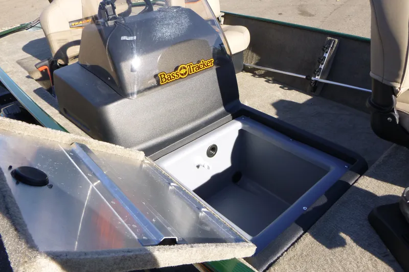 Slide: The Image of 2026 Tracker Bass Tracker Classic Limited boat interior with open storage compartment. - 19