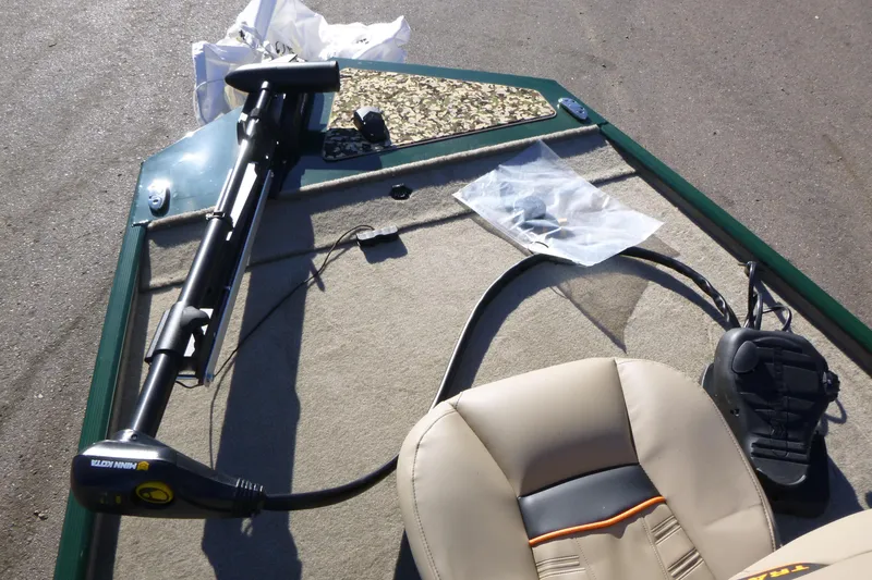 Slide: The Image of 2026 Tracker Bass Tracker Classic Limited boat interior with trolling motor and seating. - 20