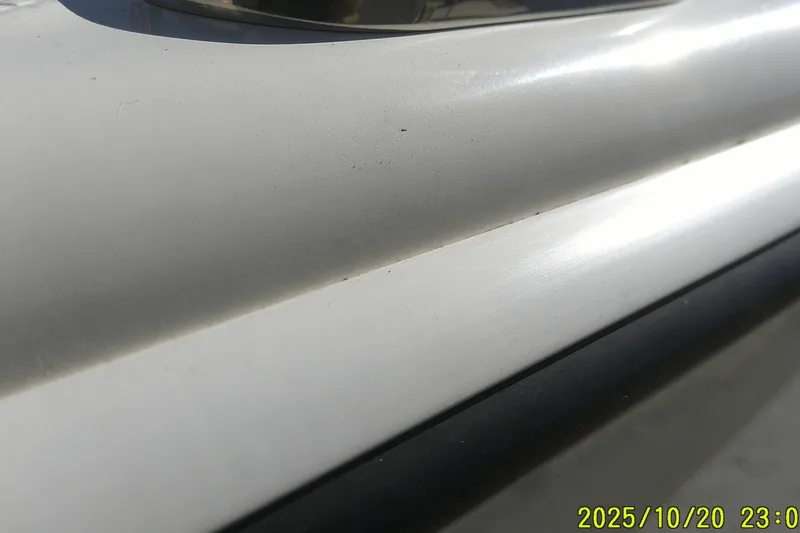 Slide: The Image of Close-up of 2025 Mako Pro Skiff 15 CC boat surface detail. - 3