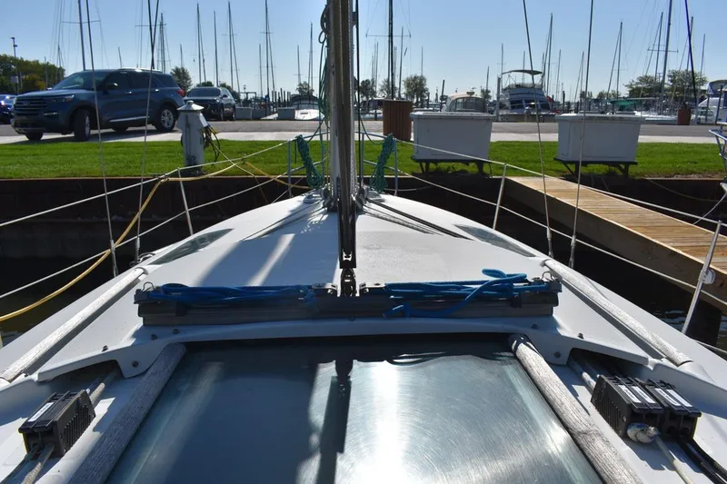 Slide: The Image of 1996 Beneteau Oceanis 321 sailboat docked at marina, view from deck. - 12