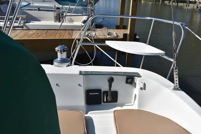 Slide: The Image of Cockpit of 1996 Beneteau Oceanis 321 sailboat with Raymarine controls and winch. - 13