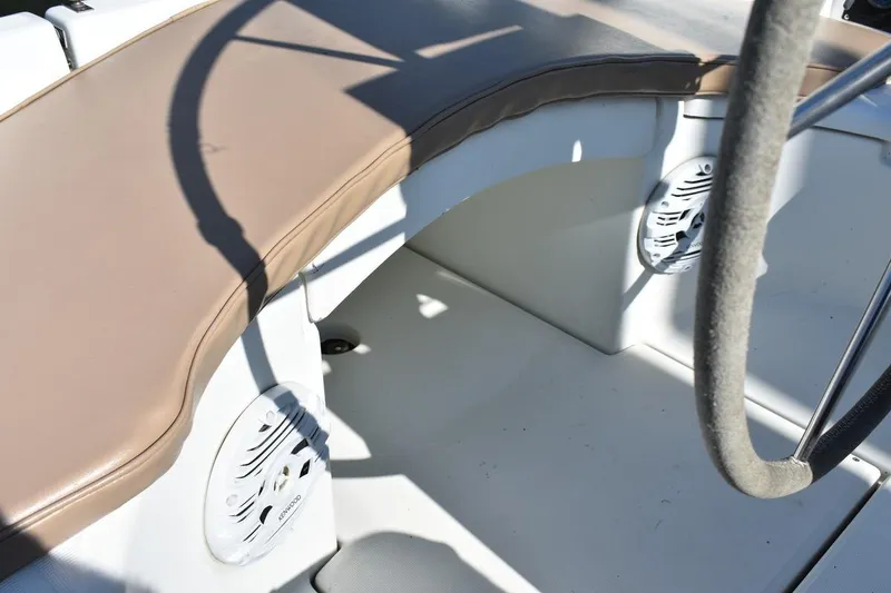 Slide: The Image of Cockpit of 1996 Beneteau Oceanis 321 sailboat with beige seating and steering wheel. - 20
