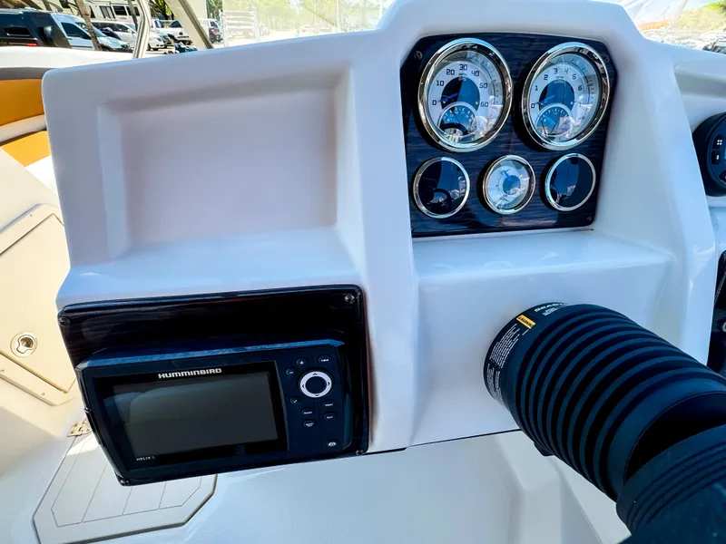 Slide: The Image of Dashboard of 2023 Starcraft SVX 190 OB boat with gauges and navigation system. - 9