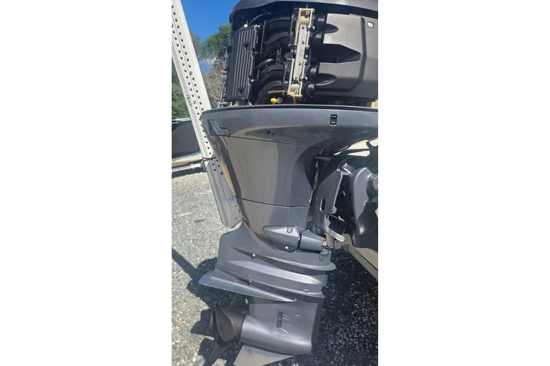 Slide: The Image of 2021 Robalo R200 Center Console outboard motor, detailed view in sunlight. - 20