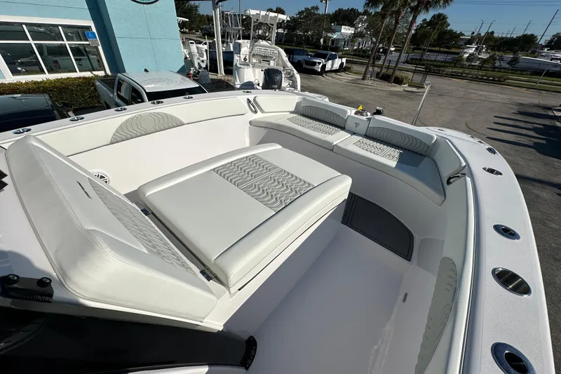 Slide: The Image of 2026 Twin Vee 280 GFX2 CC boat interior with luxurious seating and modern design. - 7