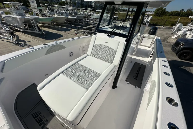 Slide: The Image of 2026 Twin Vee 280 GFX2 CC boat with sleek design and spacious deck. - 8