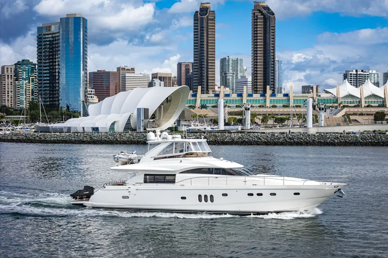 The Image of 2007 Princess 75 Fly luxury yacht cruising near modern skyline. - 0