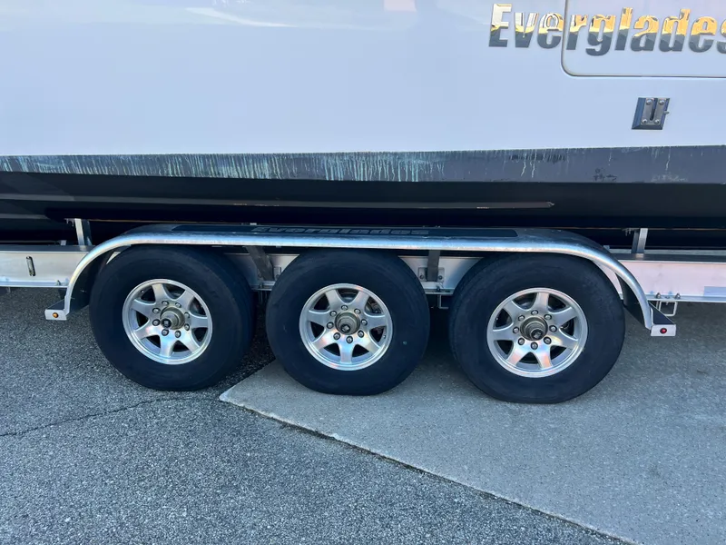 Slide: The Image of Trailer with triple axle wheels for 2012 Everglades 350LX boat. - 10