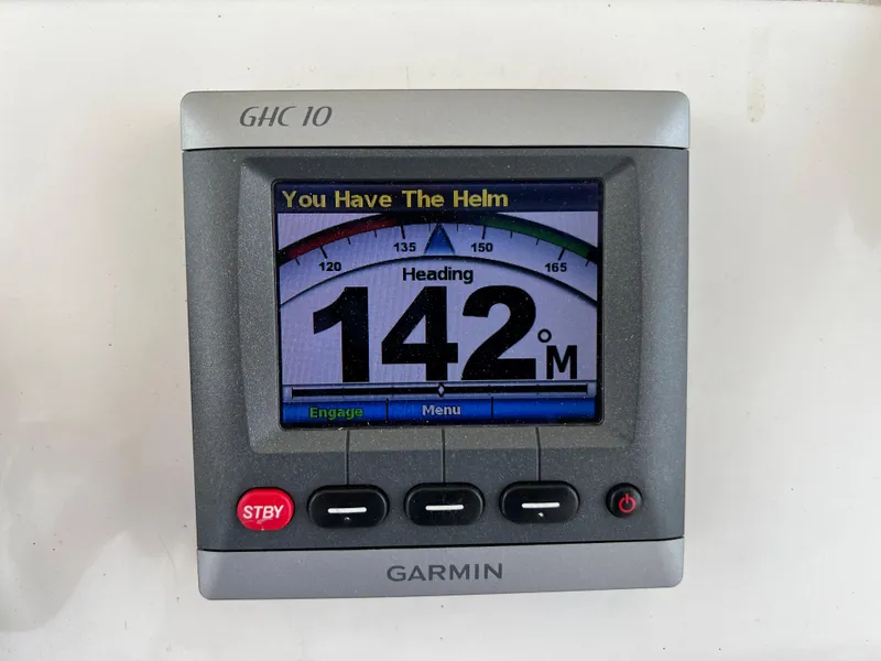 Slide: The Image of Garmin GHC 10 marine display showing heading of 142 degrees on Everglades 350LX, 2012 model. - 37