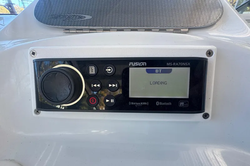 Slide: The Image of Boat stereo system in a 2005 Baja 342, displaying Bluetooth loading screen. - 27