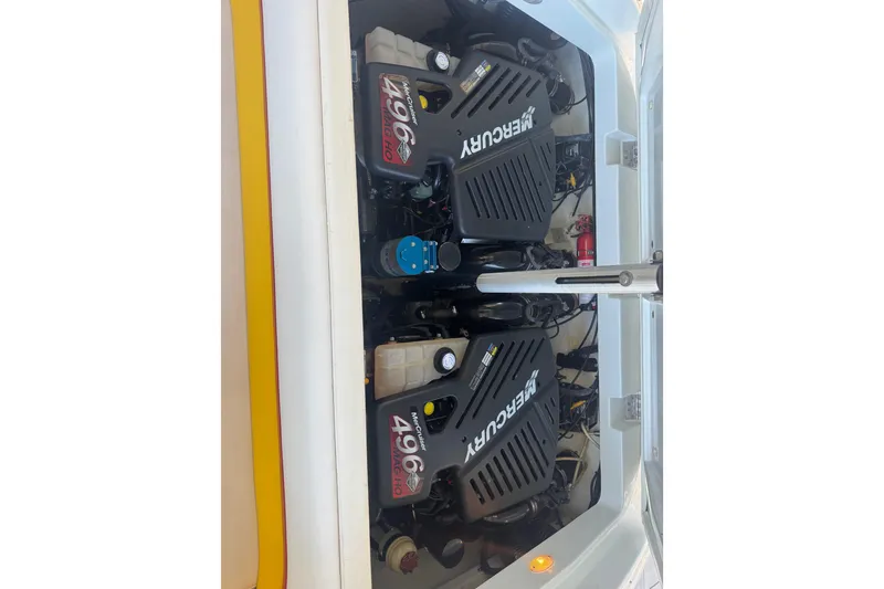 Slide: The Image of 2005 Baja 342 boat engine compartment with twin Mercury 496 MAG HO engines. - 29