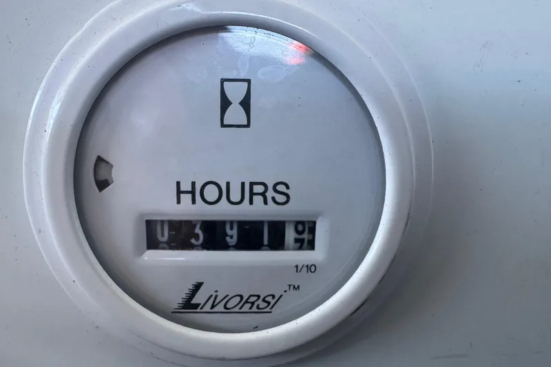 Slide: The Image of Hour meter reading 391.7 on a 2005 Baja 342 boat. - 30