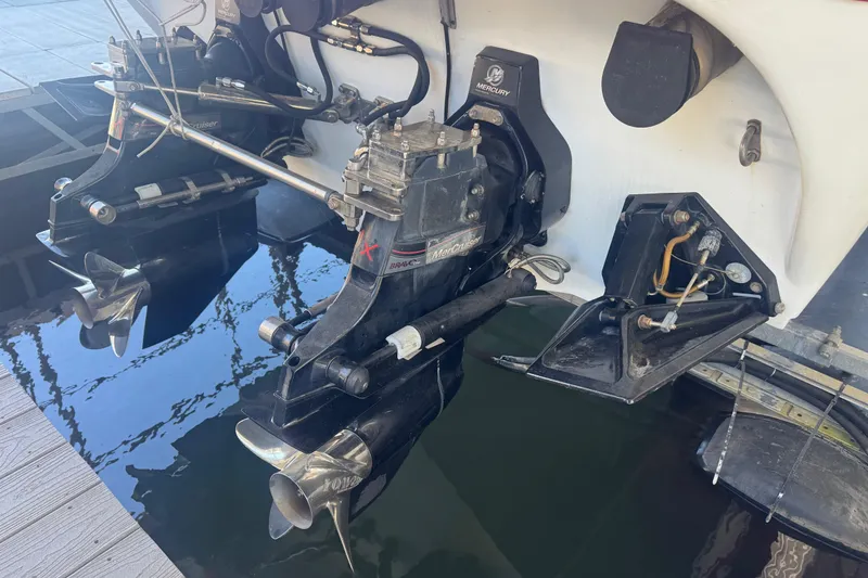 Slide: The Image of 2005 Baja 342 boat with dual Mercury MerCruiser outdrives at dock. - 33