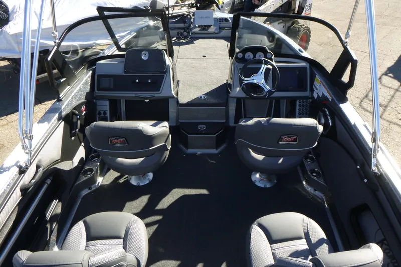 Slide: The Image of Interior view of 2026 Ranger 2080MS boat with dual consoles and seating. - 12