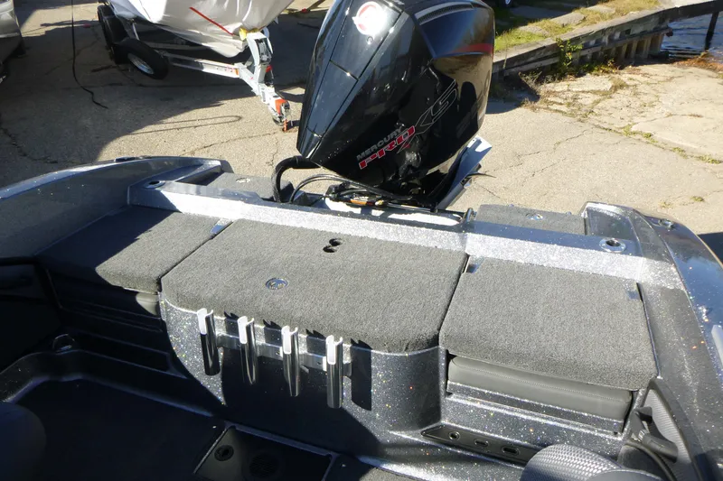 Slide: The Image of 2026 Ranger 2080MS boat with Mercury Pro XS outboard motor, docked on concrete. - 13