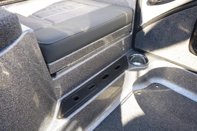 Slide: The Image of Interior of 2026 Ranger 2080MS boat with seating and cup holder. - 16