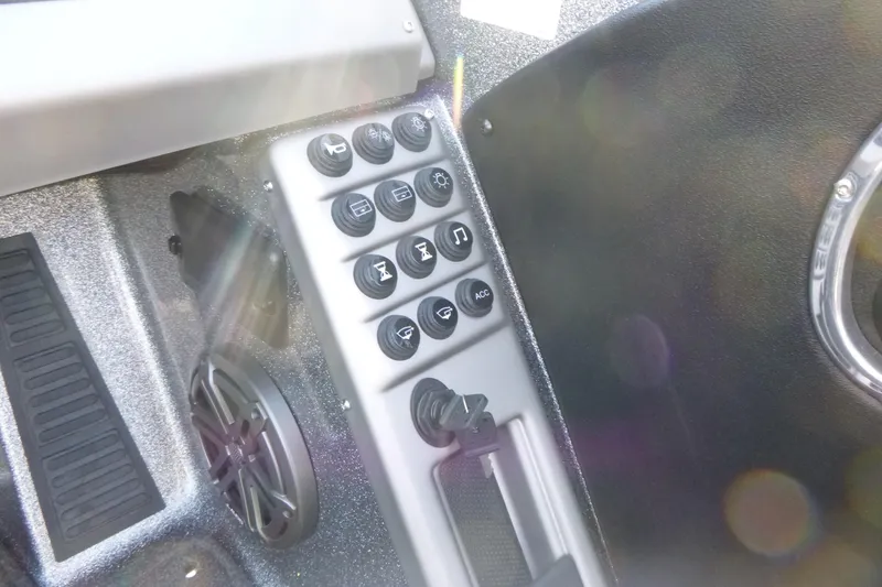 Slide: The Image of Control panel of 2026 Ranger 2080MS boat with various buttons and speaker. - 21