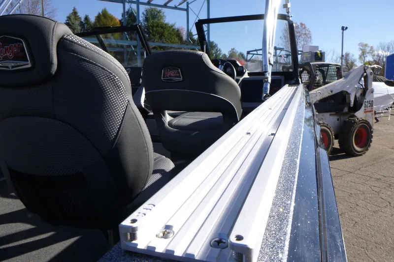 Slide: The Image of 2026 Ranger 2080MS boat interior with sleek seating and modern design. - 23