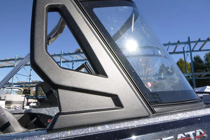 Slide: The Image of 2026 Ranger 2080MS boat windshield with sleek design under clear blue sky. - 3