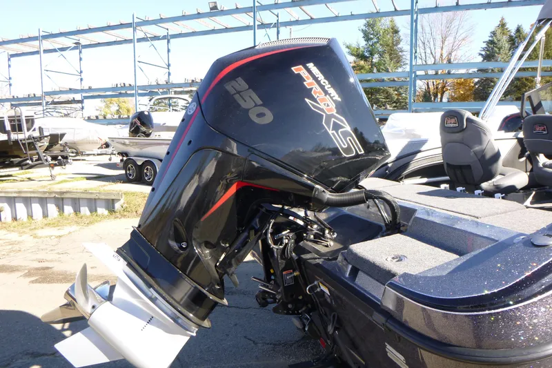 Slide: The Image of 2026 Ranger 2080MS boat with Mercury Pro XS 250 outboard motor in a marina setting. - 9
