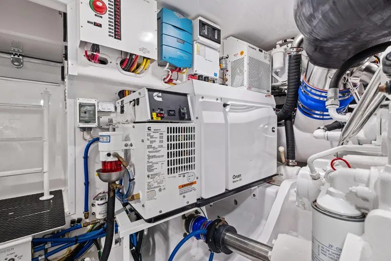 Slide: The Image of Engine room of 2025 Viking 64 Convertible yacht with advanced equipment and systems. - 46