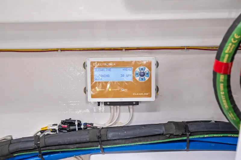 Slide: The Image of Control panel in 2025 Viking 64 Convertible yacht engine room, displaying ElectroSea Clearline system. - 50